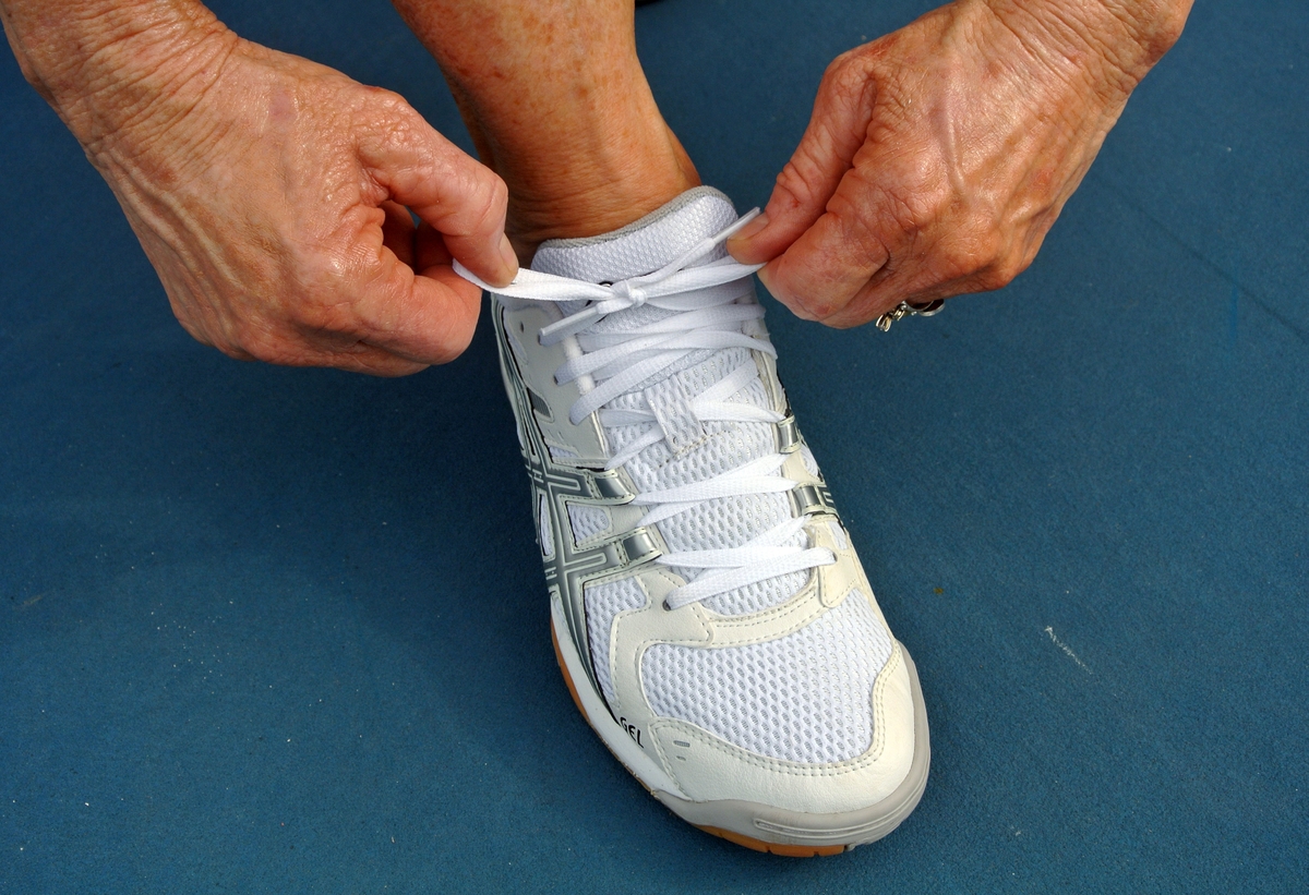 Woman lacing up