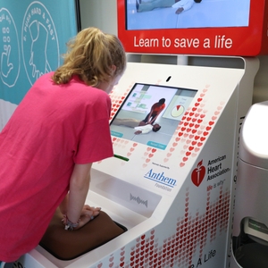 Girl practicing CPR