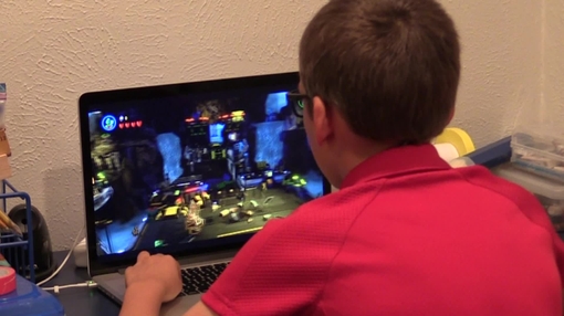 Boy playing computer games
