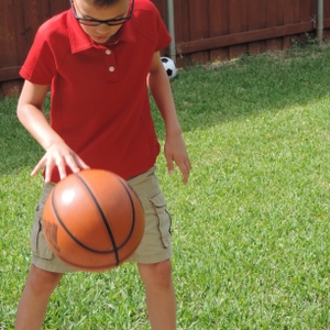 Boy dribbling a basketball