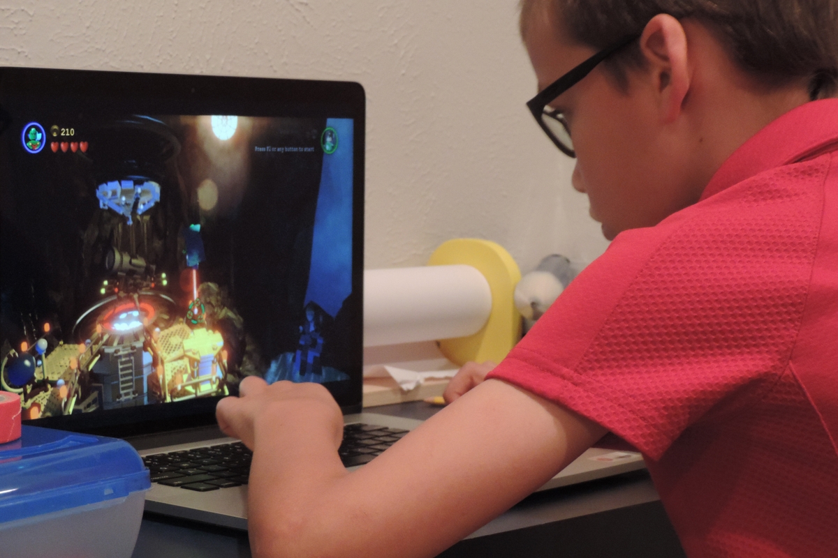 Boy playing a computer game