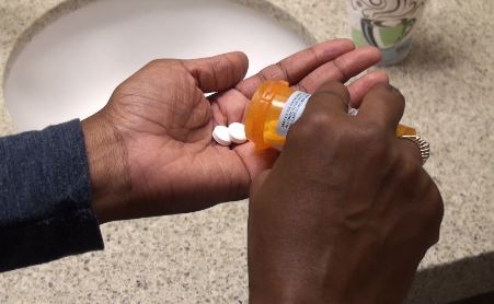 Opioids- in womans hand