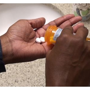 Opioids- in womans hand