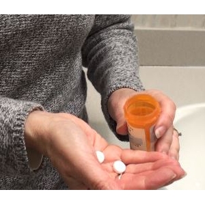 Opioids- woman with pills
