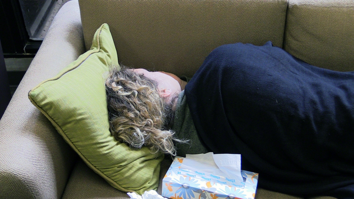 Woman resting with cold-flu