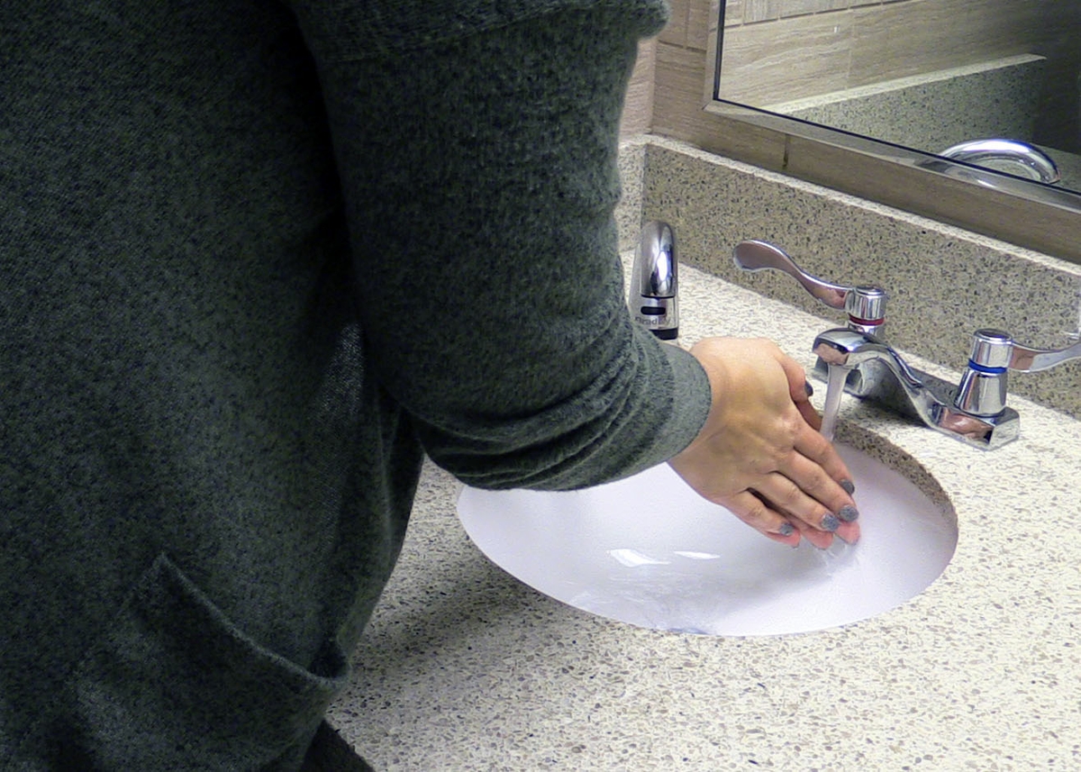 Woman washing hands