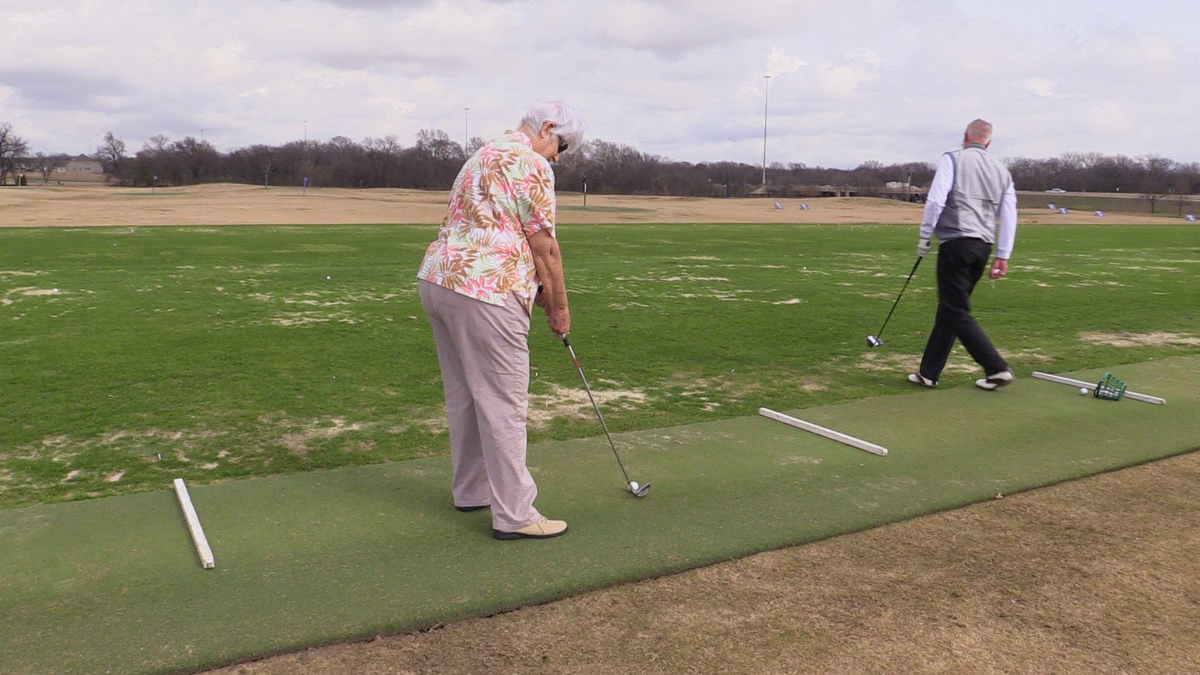 Woman golfing 2