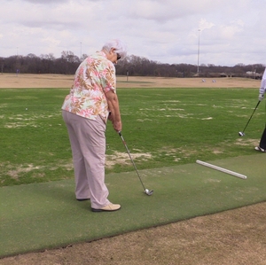 Woman golfing 2