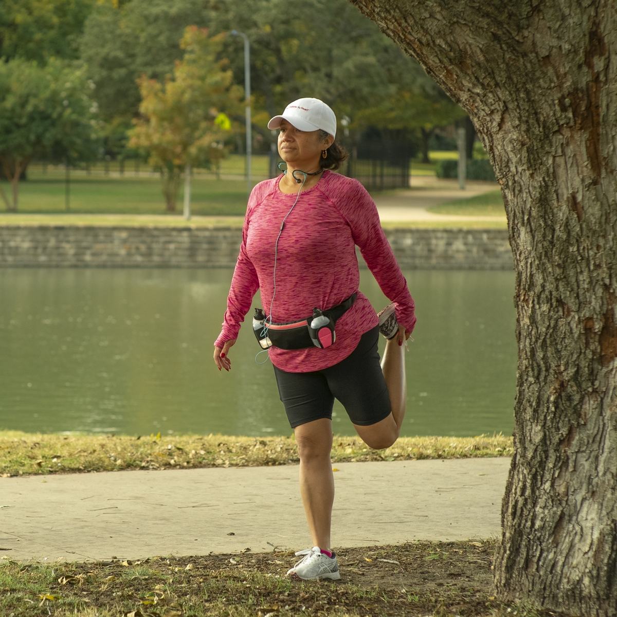 Woman stretching at a park