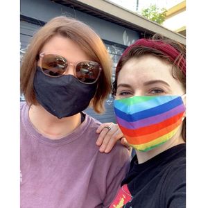 LGBT Couple woman with rainbow mask