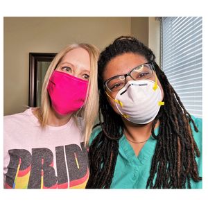 LGBT Couple with masks