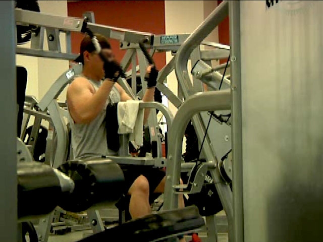 man doing resistance training