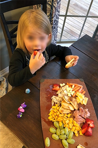 child snacking