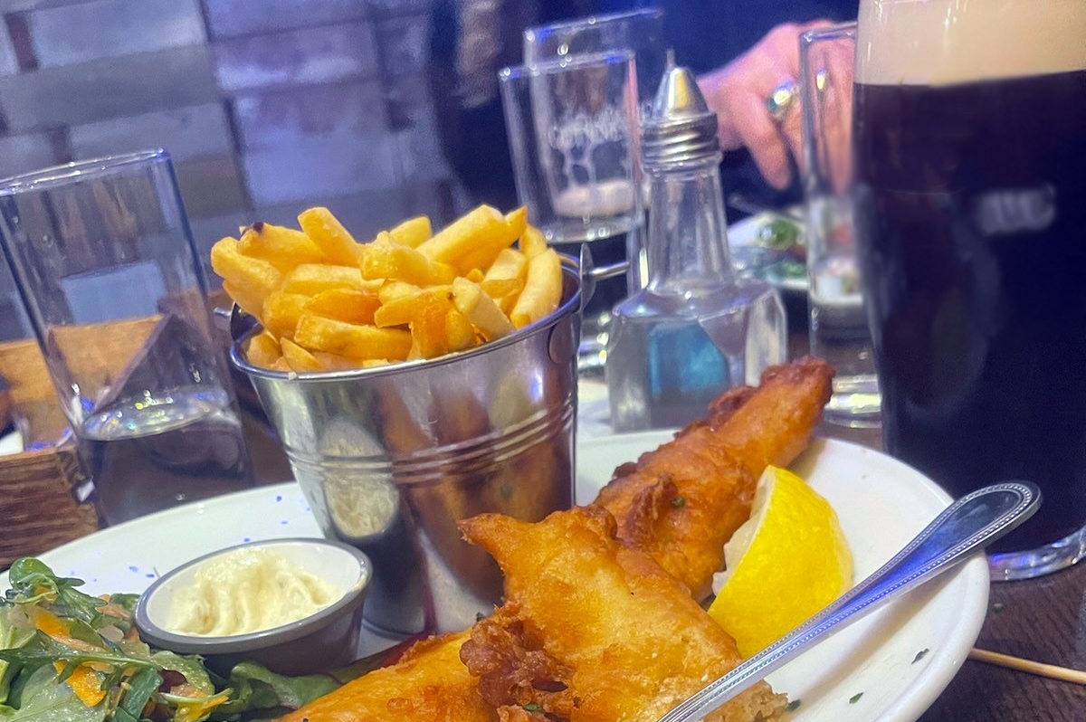 fried fish and chips dark beer