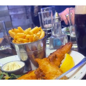 fried fish and chips dark beer