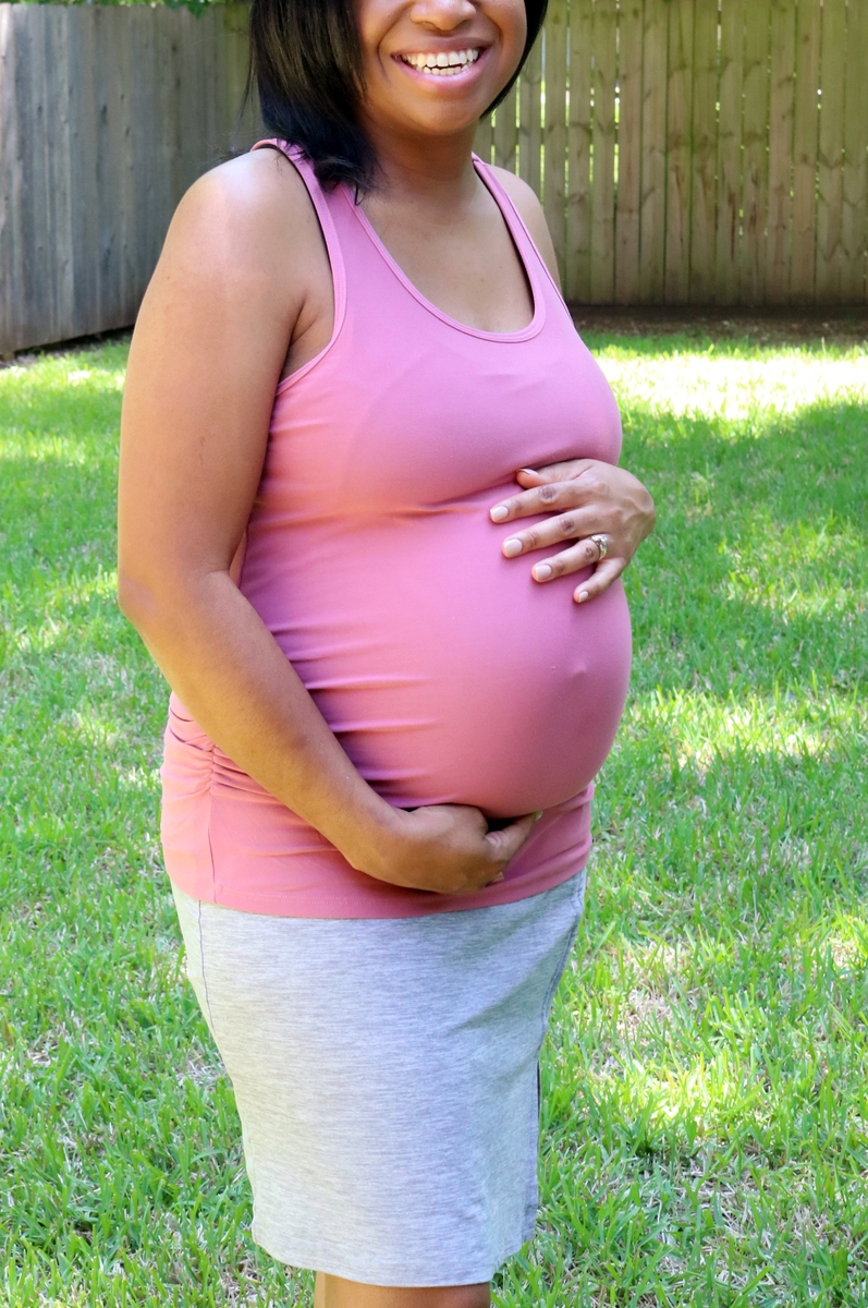 Mom holding baby bump