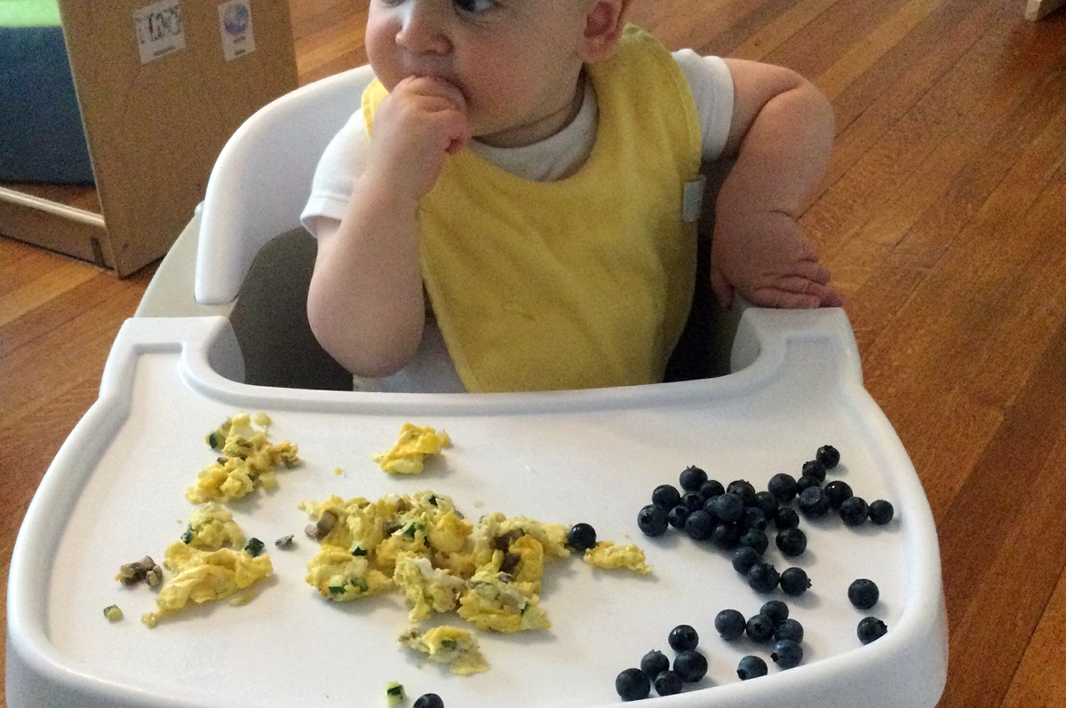 Toddler with healthy snacks