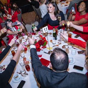 Table toasting during Open Your Heart