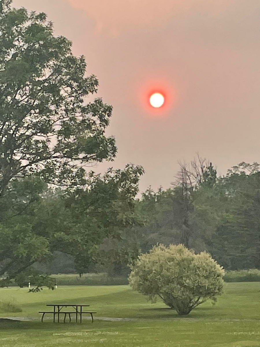 Wildfire - red, smoky haze over Utica, NY (2023)