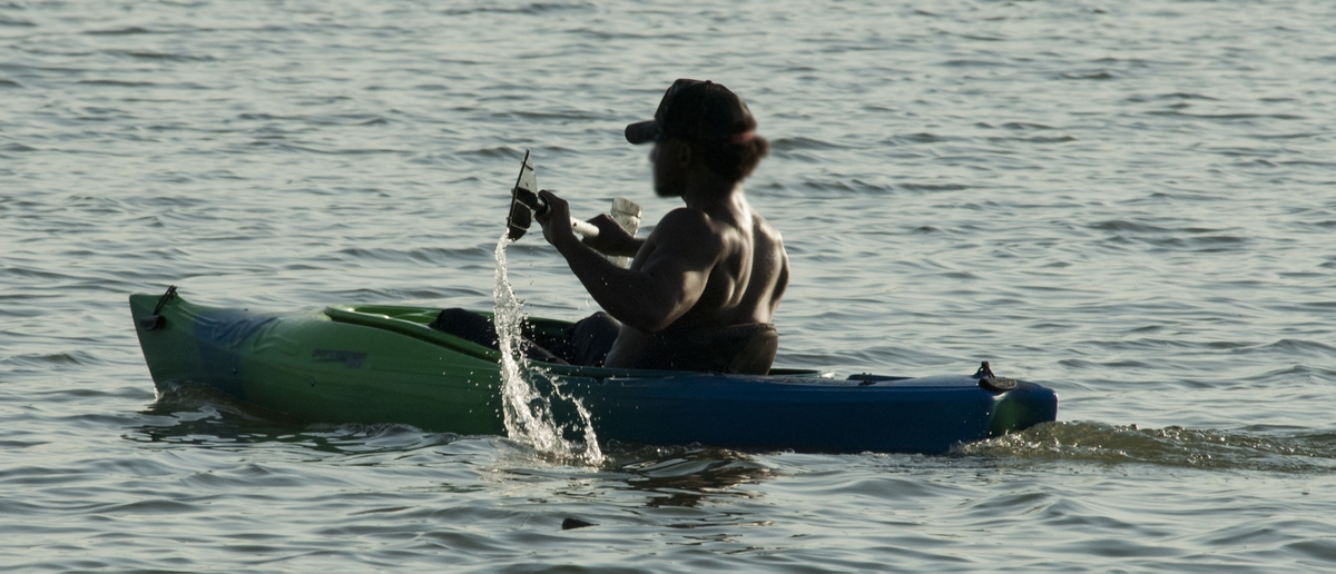 Solo Kayaker on the lake