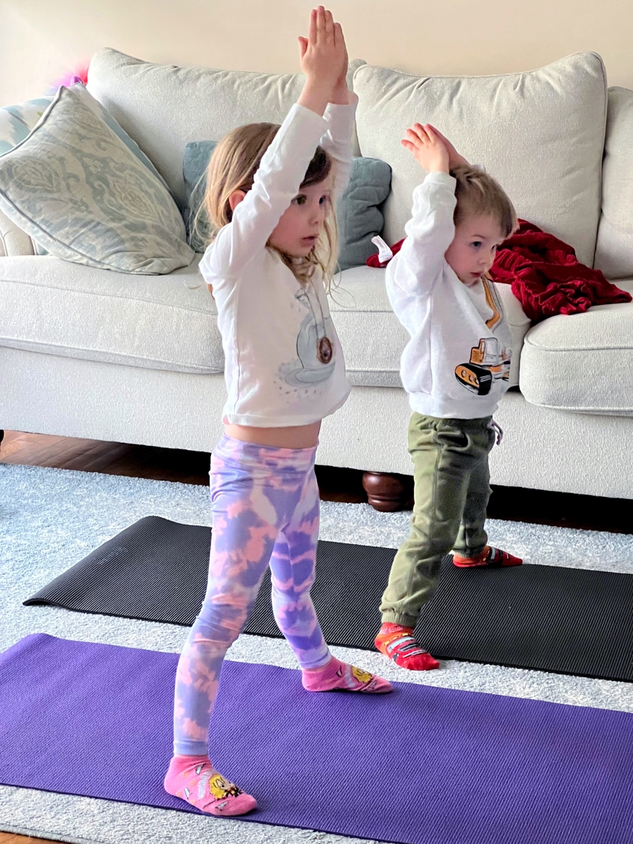 Kids doing yoga pose