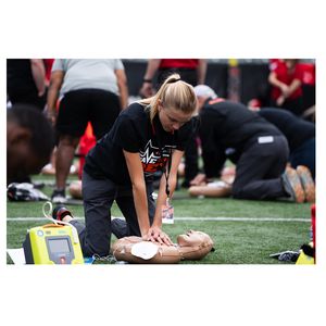 Female participant in Bengals CPR training event