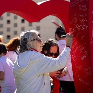 Miami Dade Heart Walk 11-23-24 woman signing banner