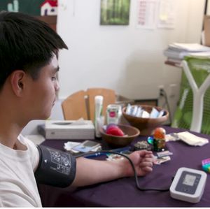 POIC Students using blood pressure monitors 