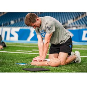 Participant Practicing CPR American Heart Association CPR Training Event