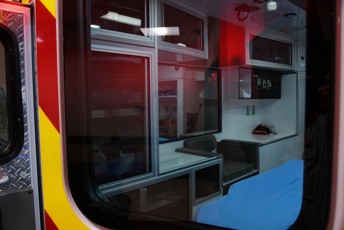 Ambulance bed through window