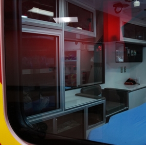 Ambulance bed through window