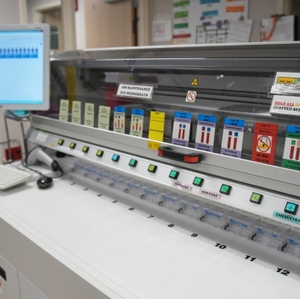 Lab sample processing area with monitor