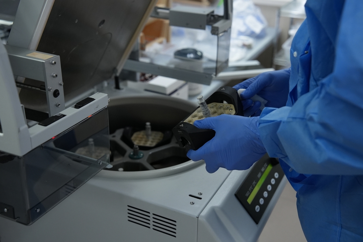 Lab tech processing blood samples
