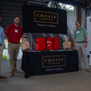 Choate Construction Team with event display at Charleston Hard Hats with Heart Event
