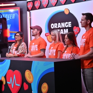Orange Team Playing Heartsaver Heroes Showdown Game