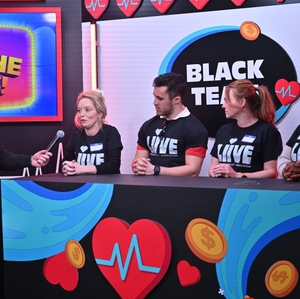 Black Team Playing Heartsaver Heroes Showdown Game