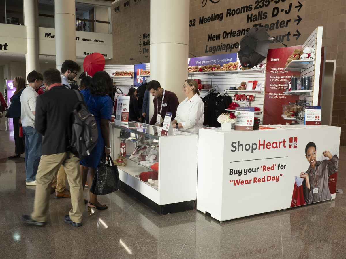 Shoppers at SS25 ShopHeart booth