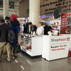 Shoppers at SS25 ShopHeart booth