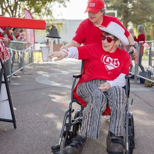 Kern County Heart and Stroke Walk participant rings the survivor bell