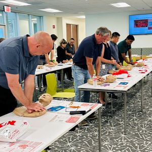 Pacific Coast Building Products Inc. staff learning Hands-Only CPR
