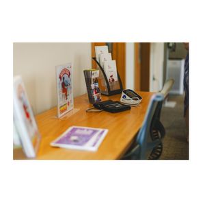 Self-monitoring blood pressure cuff station 