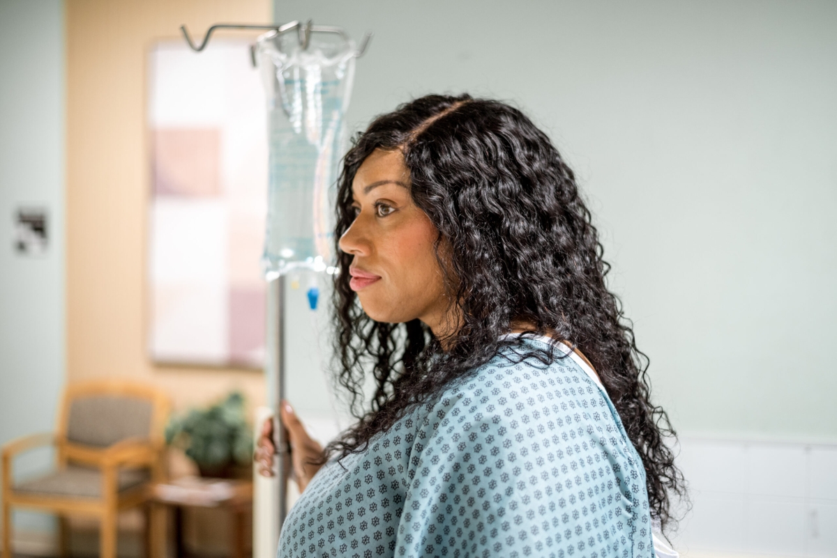 Close-up of woman in patient gown