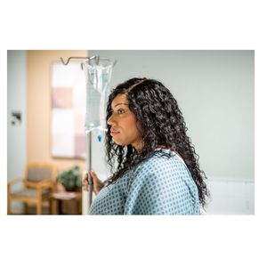 Close-up of woman in patient gown
