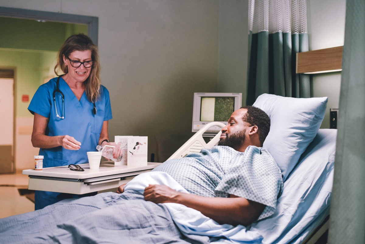 Man being treated in hospital