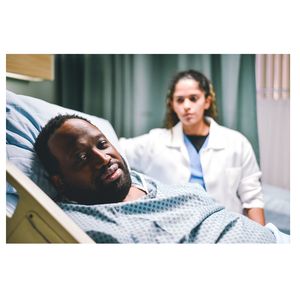 Man in hospital bed