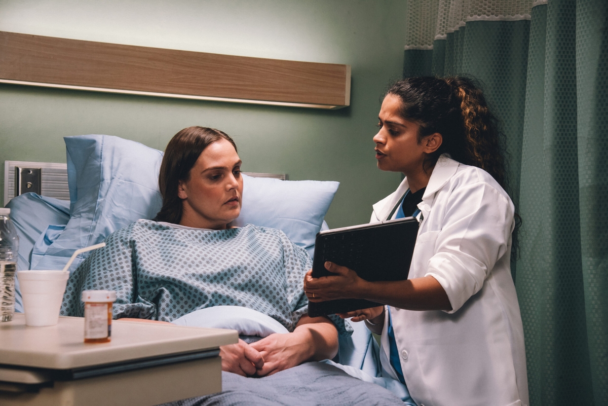 Woman in exam room for consultation