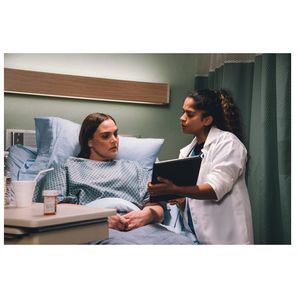 Woman in exam room for consultation