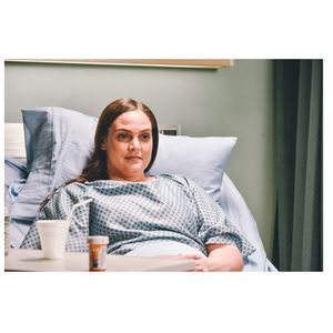 Woman in hospital bed