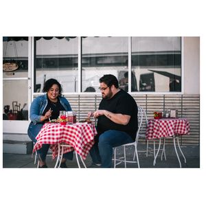Couple eating outdoors