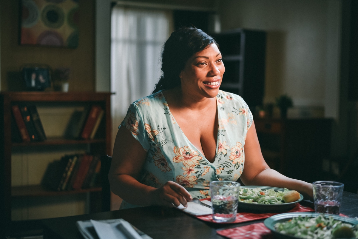 Woman eating salad